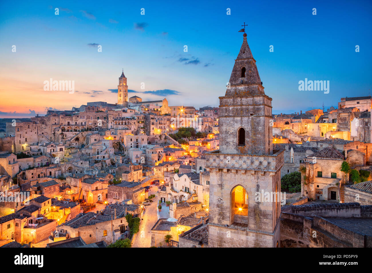 Matera, Italy. Cityscape image of medieval city of Matera, Italy during beautiful sunrise. Stock Photo