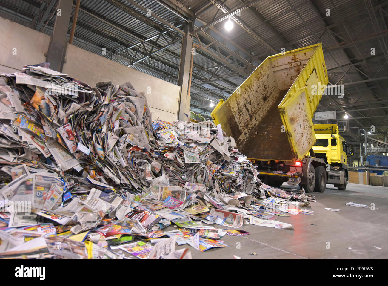 Truck transports recovered paper for recycling in a mill - paper production in a mill Stock Photo
