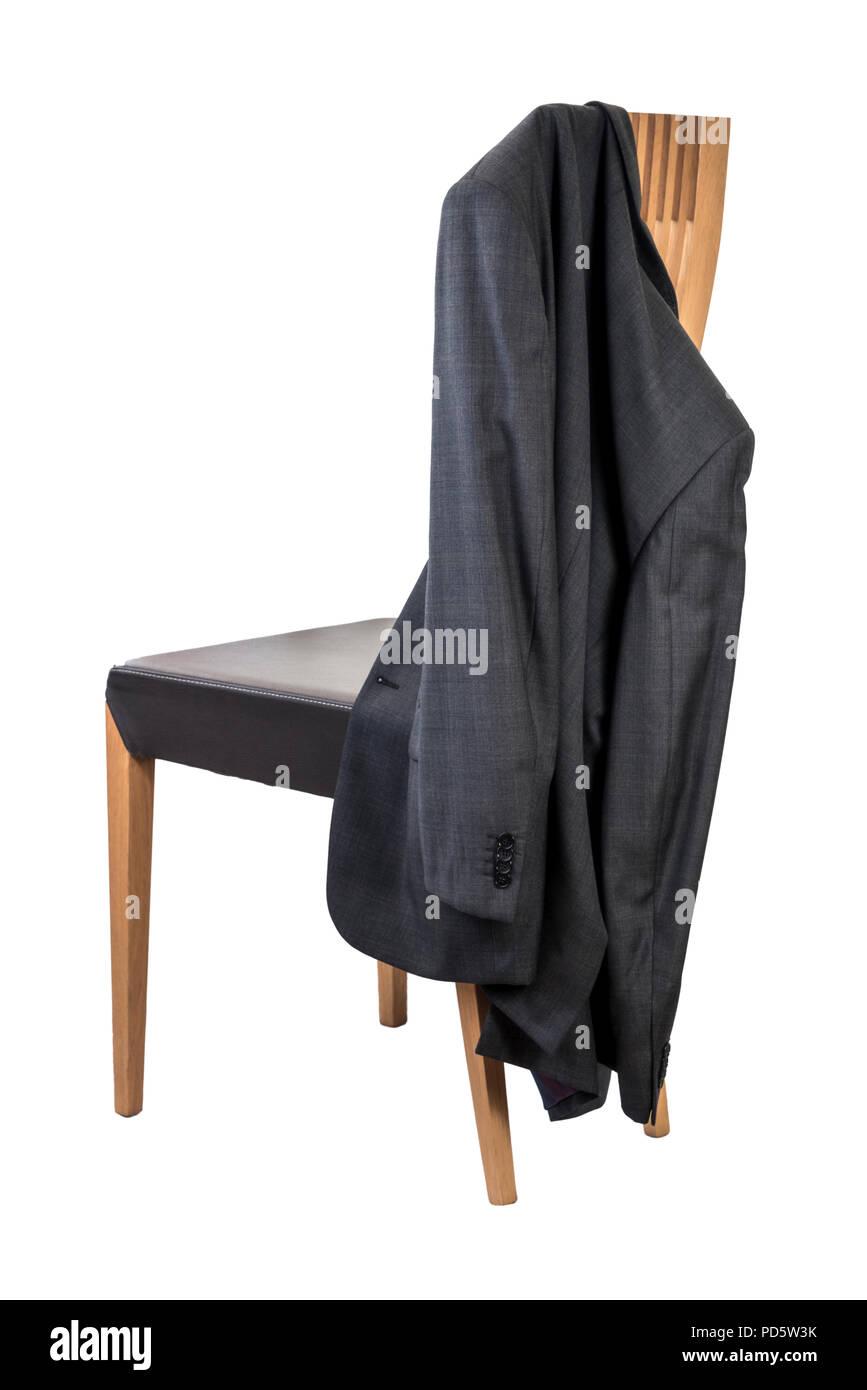 High back modern dining chair with leather seat, isolated on white. Jacket hanging on the back. Stock Photo