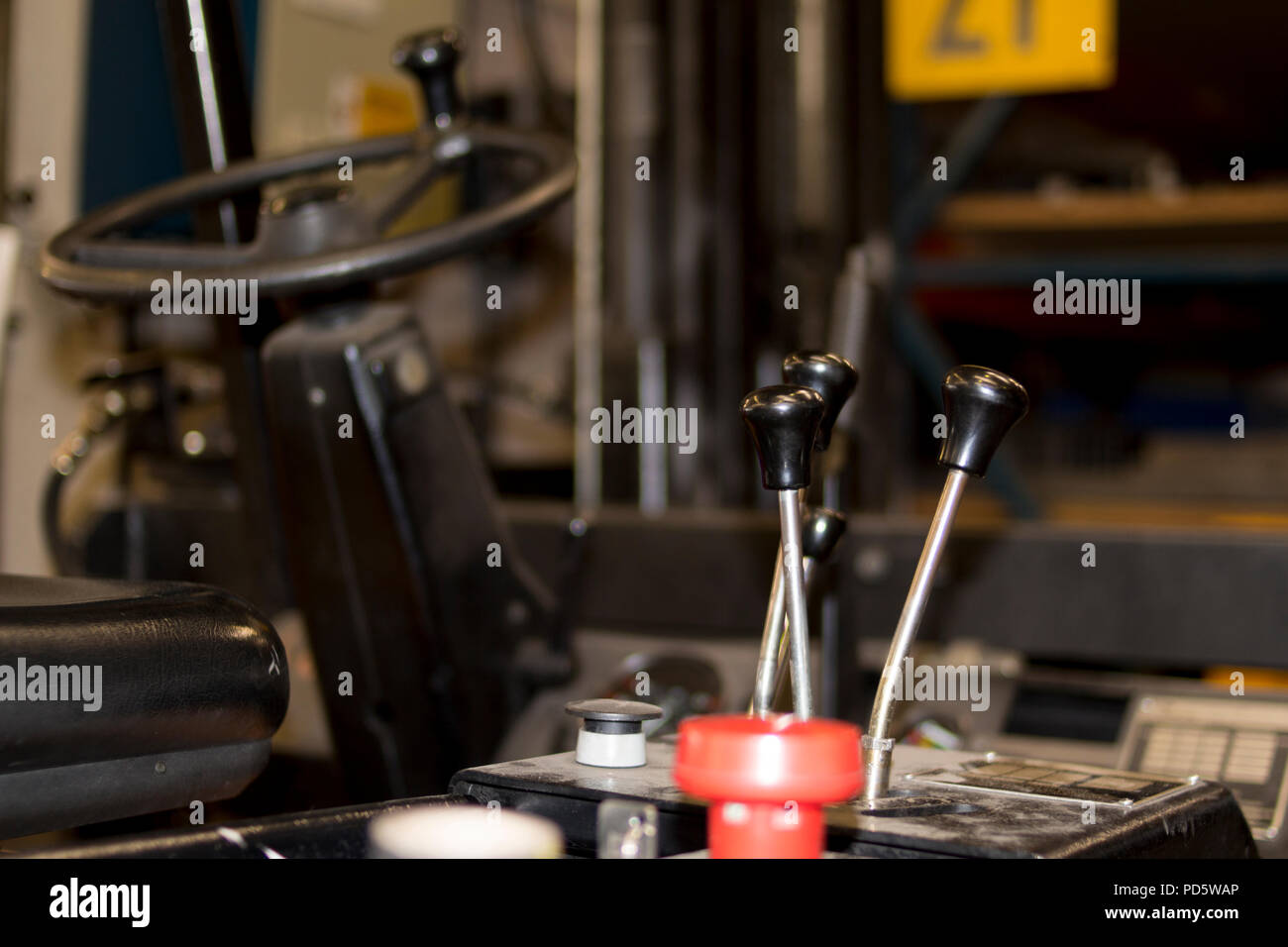 Forklift operator workplace steering wheel cockpit in an industrial