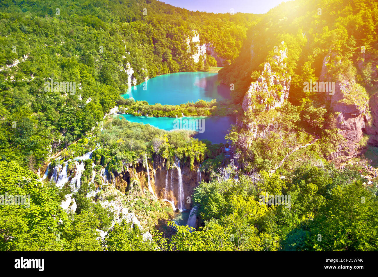 Paradise waterfalls of Plitvice lakes national park at sun haze view, panoramic view, Croatia Stock Photo