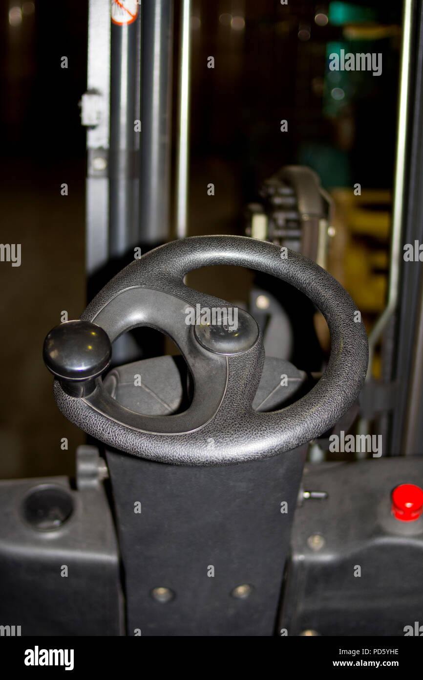 Used forklift steering wheel cockpit in an industrial company service