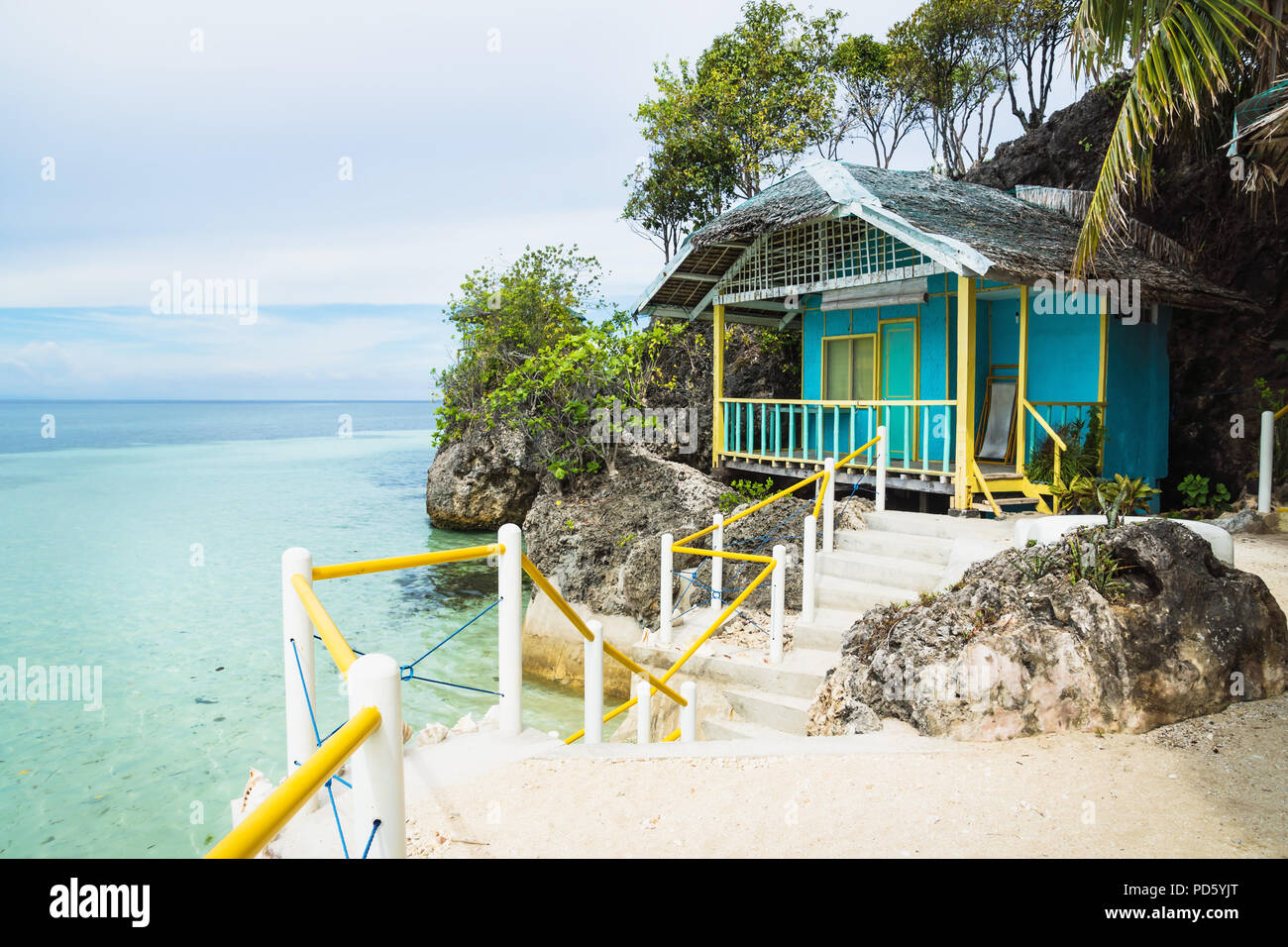 Small turquoise Bungalow at the ocean of Siquijor, Philippines, Asia Stock Photo