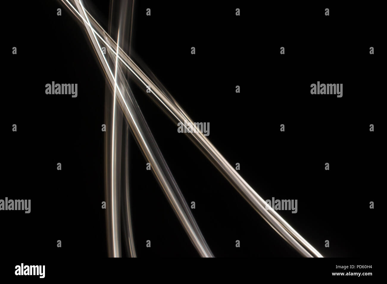 Light trails and light painting with dark background Stock Photo - Alamy