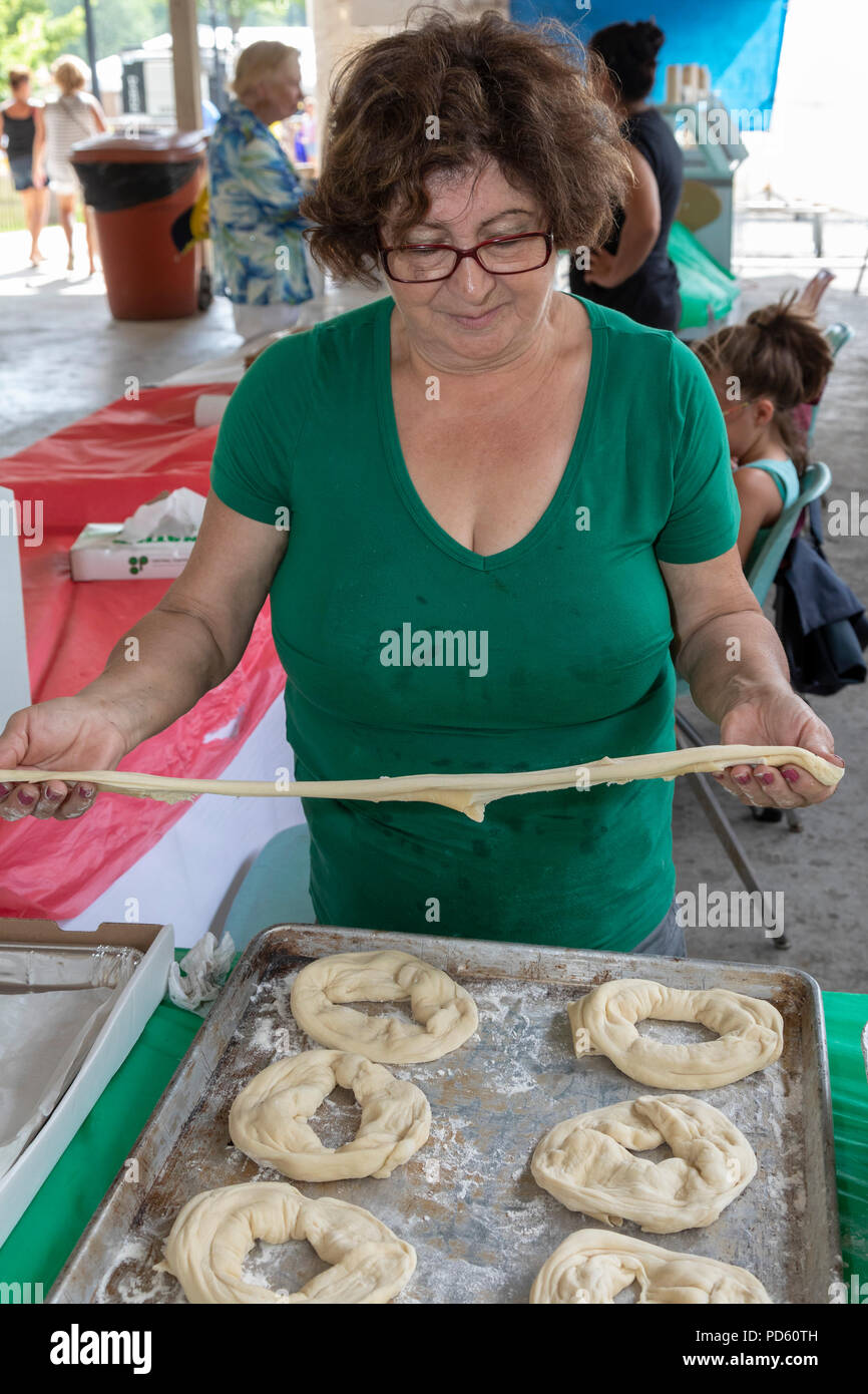 Dearborn, Michigan - A woman makes pane fritto in the Italian-American tent at the annual Dearborn homecoming festival. Stock Photo