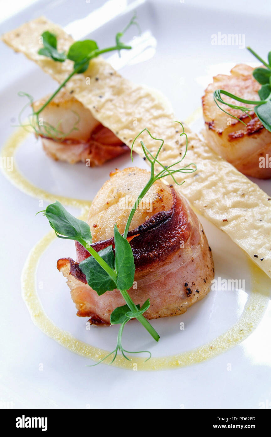 bacon wrapped scallop appetizer Stock Photo Alamy