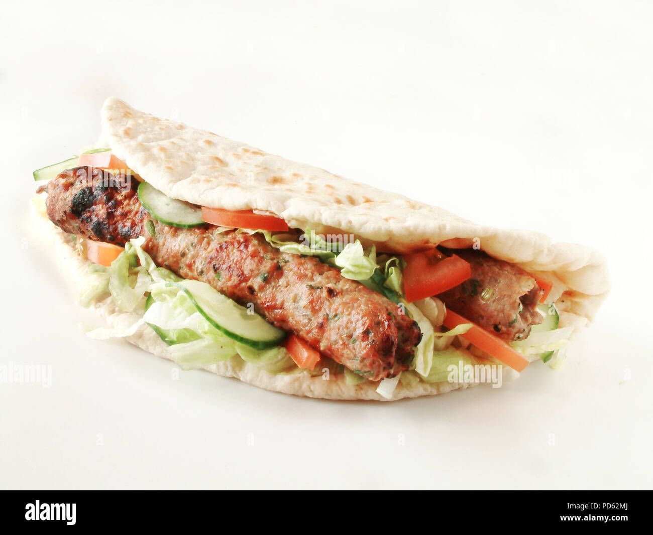indian tikka shish kebab naan wrap Stock Photo - Alamy