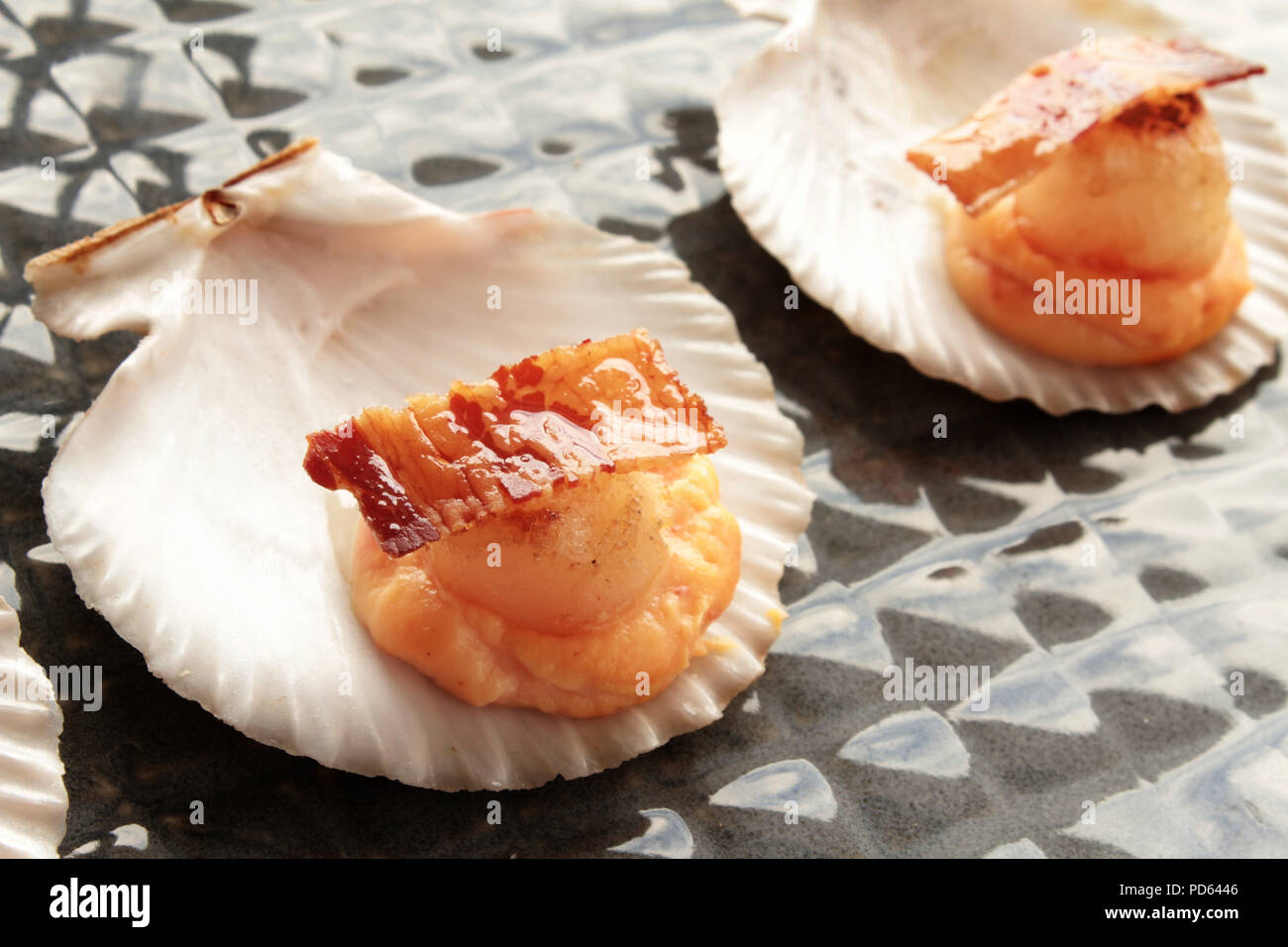 scallop appetizer in shell Stock Photo - Alamy
