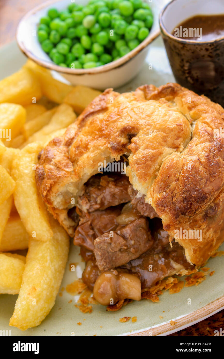 plated steak pie and chips dinner Stock Photo Alamy