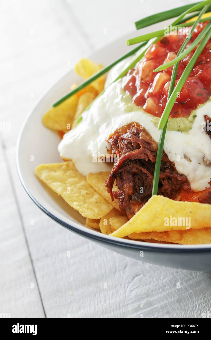 tortilla chips with pulled pork Stock Photo Alamy