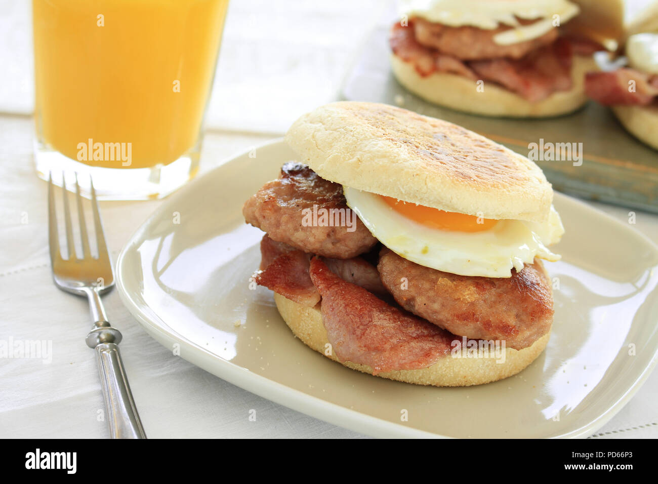 cooked sausage egg and bacon breakfast muffin Stock Photo Alamy