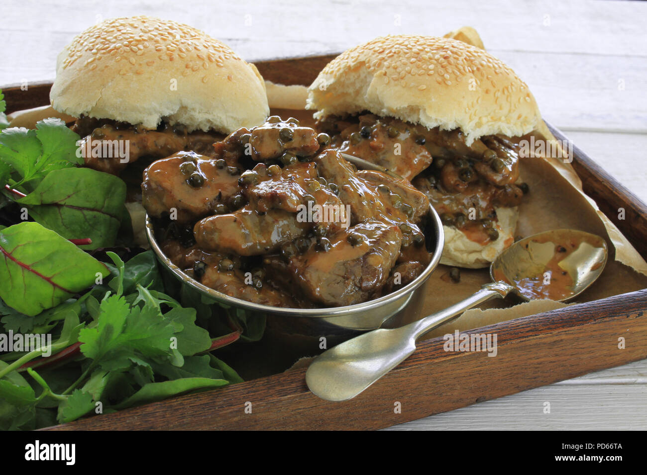 steak in peppercorn sauce sandwich roll Stock Photo Alamy