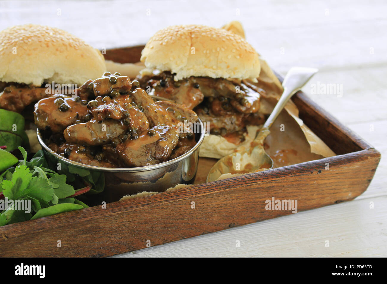 steak in peppercorn sauce sandwich roll Stock Photo Alamy