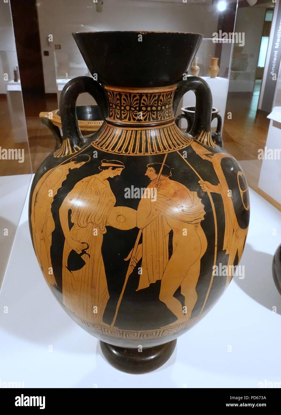 Amphora with departure of warriors and conversing youths, Amykos painter, Greek, South Italy, Lucanian, c. 430-400 BC, red-figure technique on earthenware - Stock Photo
