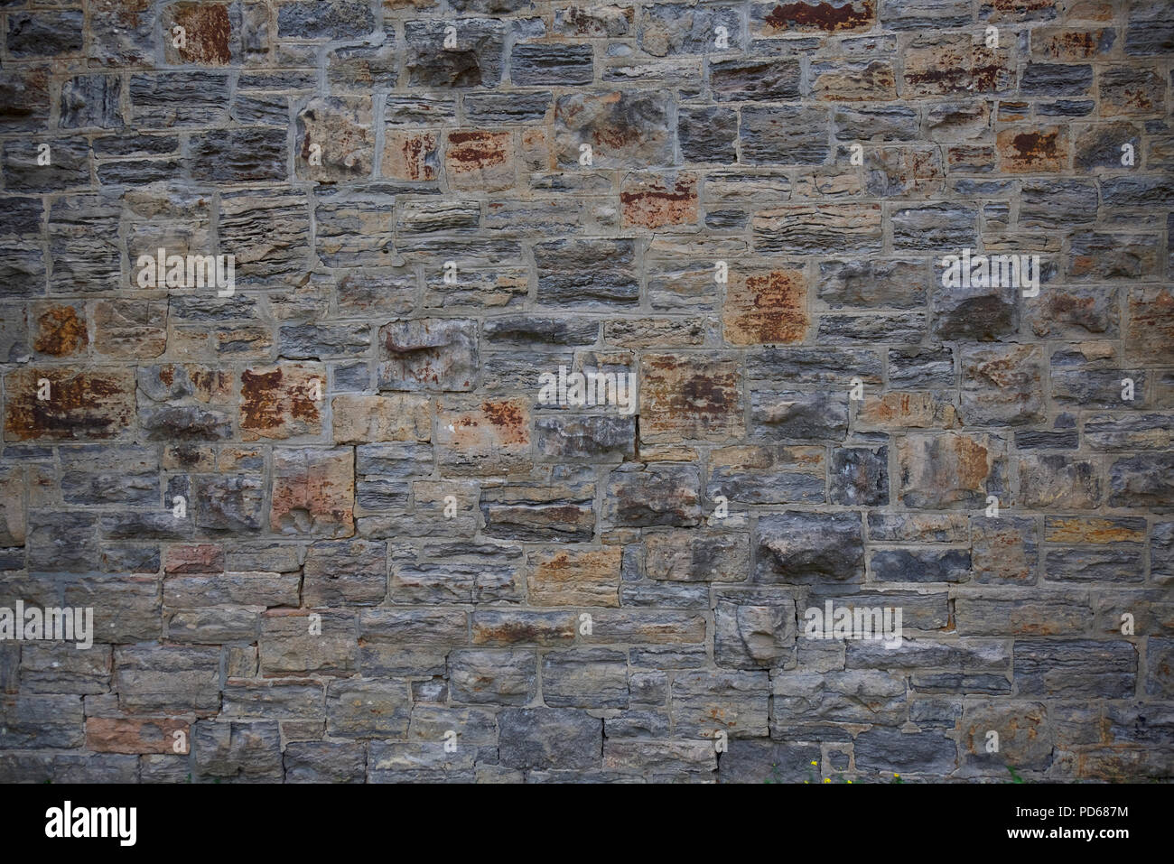 Old stone wall in Montreal with fracturing mortaring Stock Photo Alamy