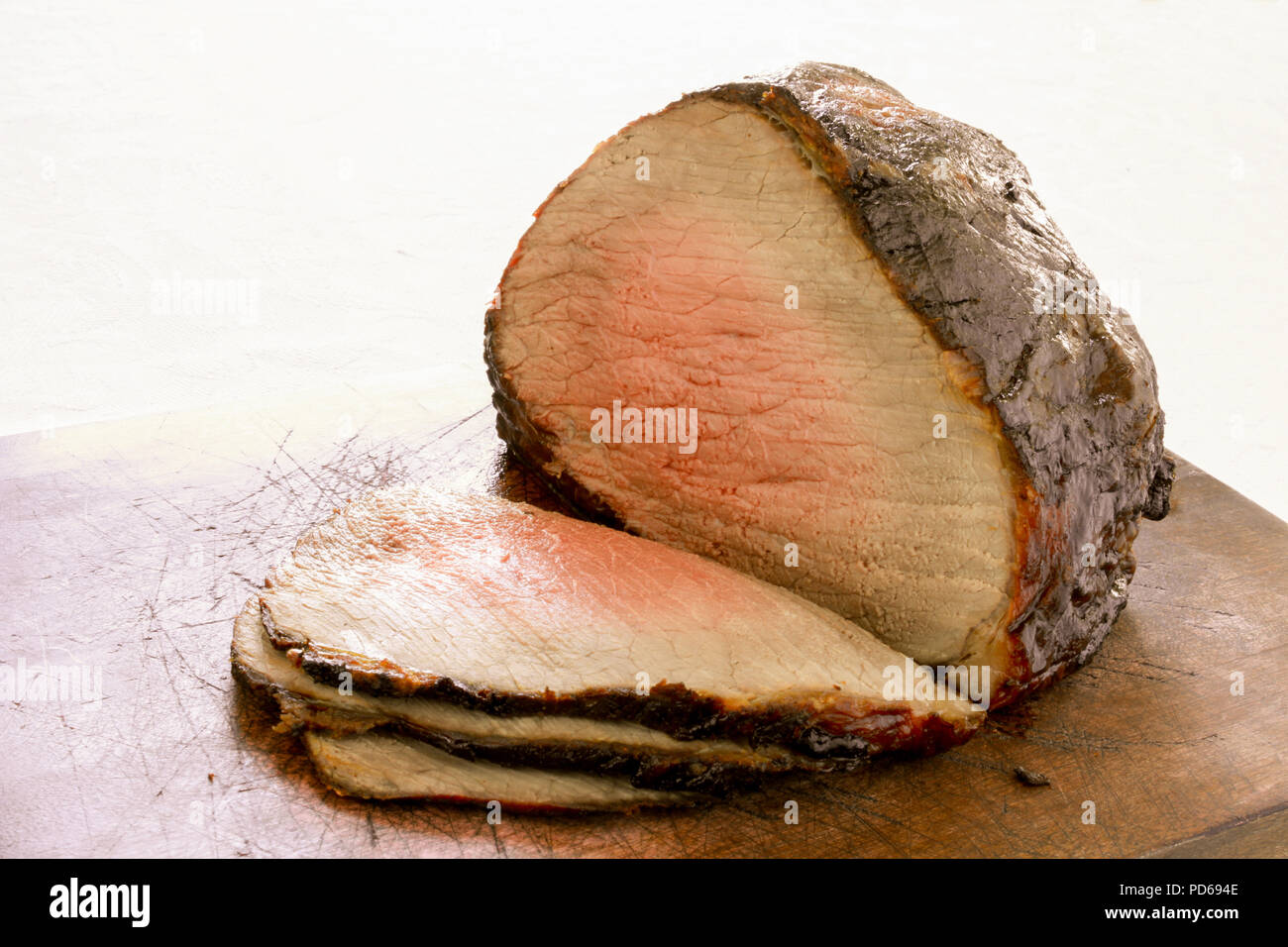 cooked roast beef joint Stock Photo Alamy