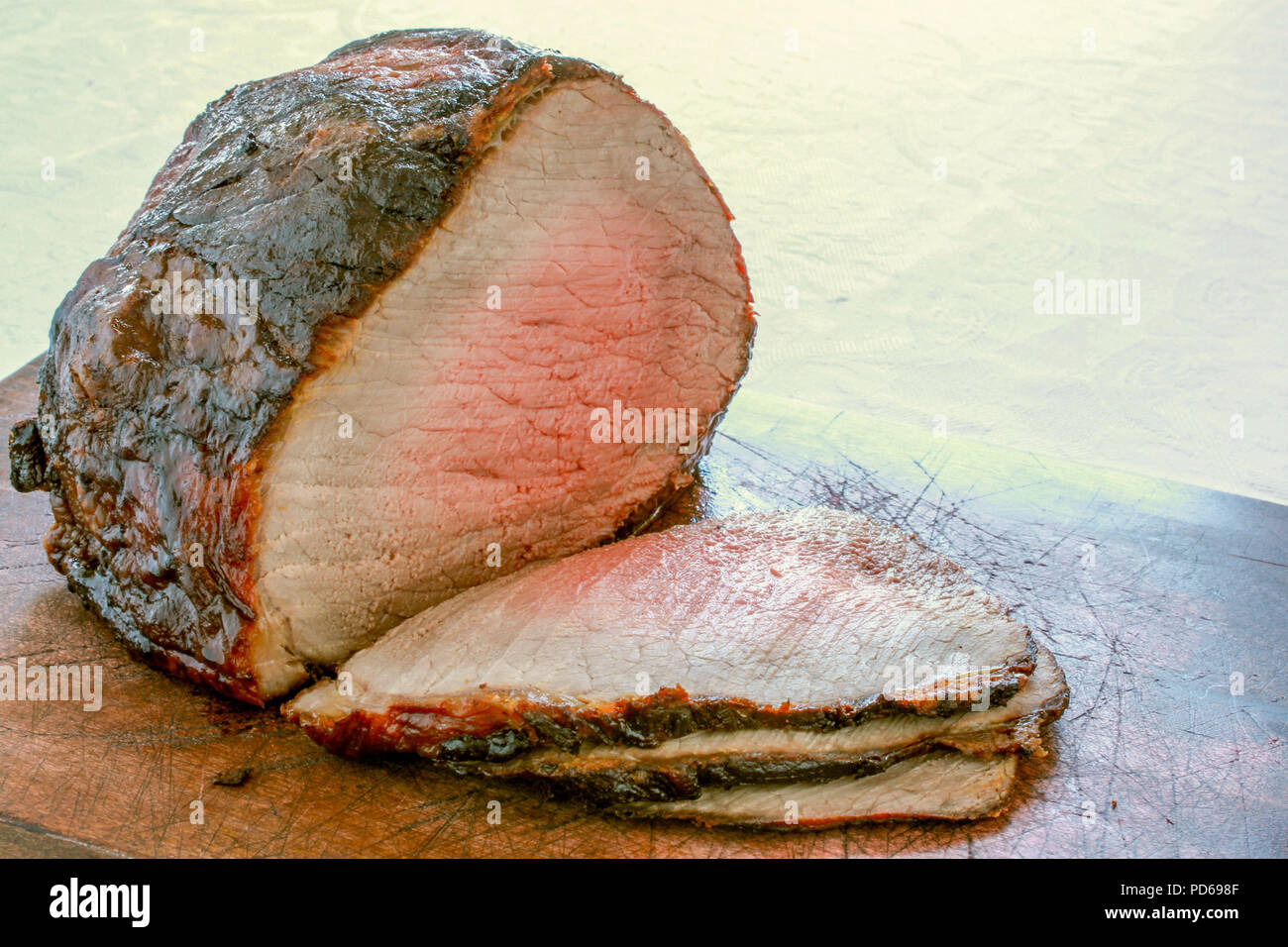 cooked roast beef joint Stock Photo Alamy
