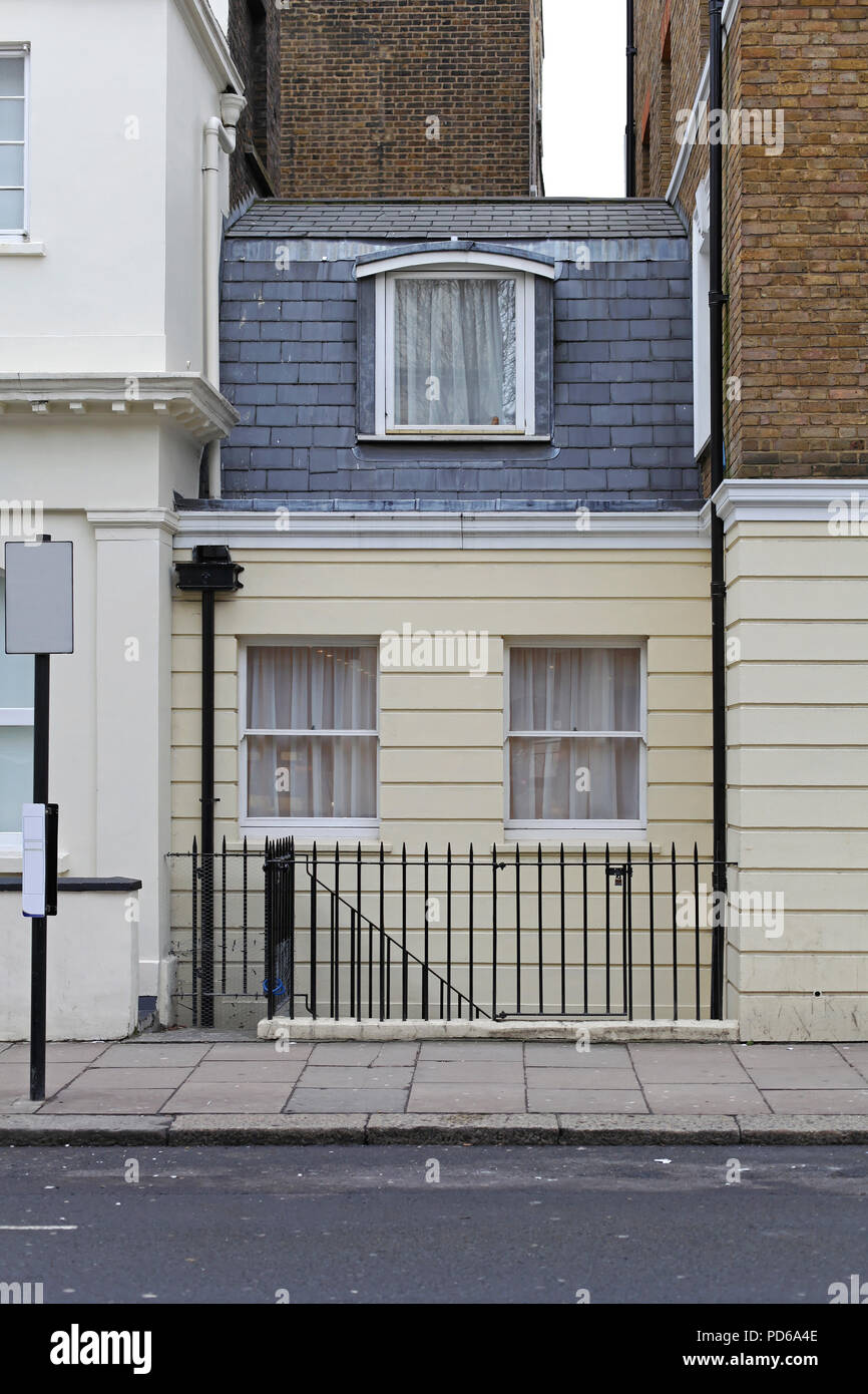 Narrow and small Victorian house in London Stock Photo - Alamy