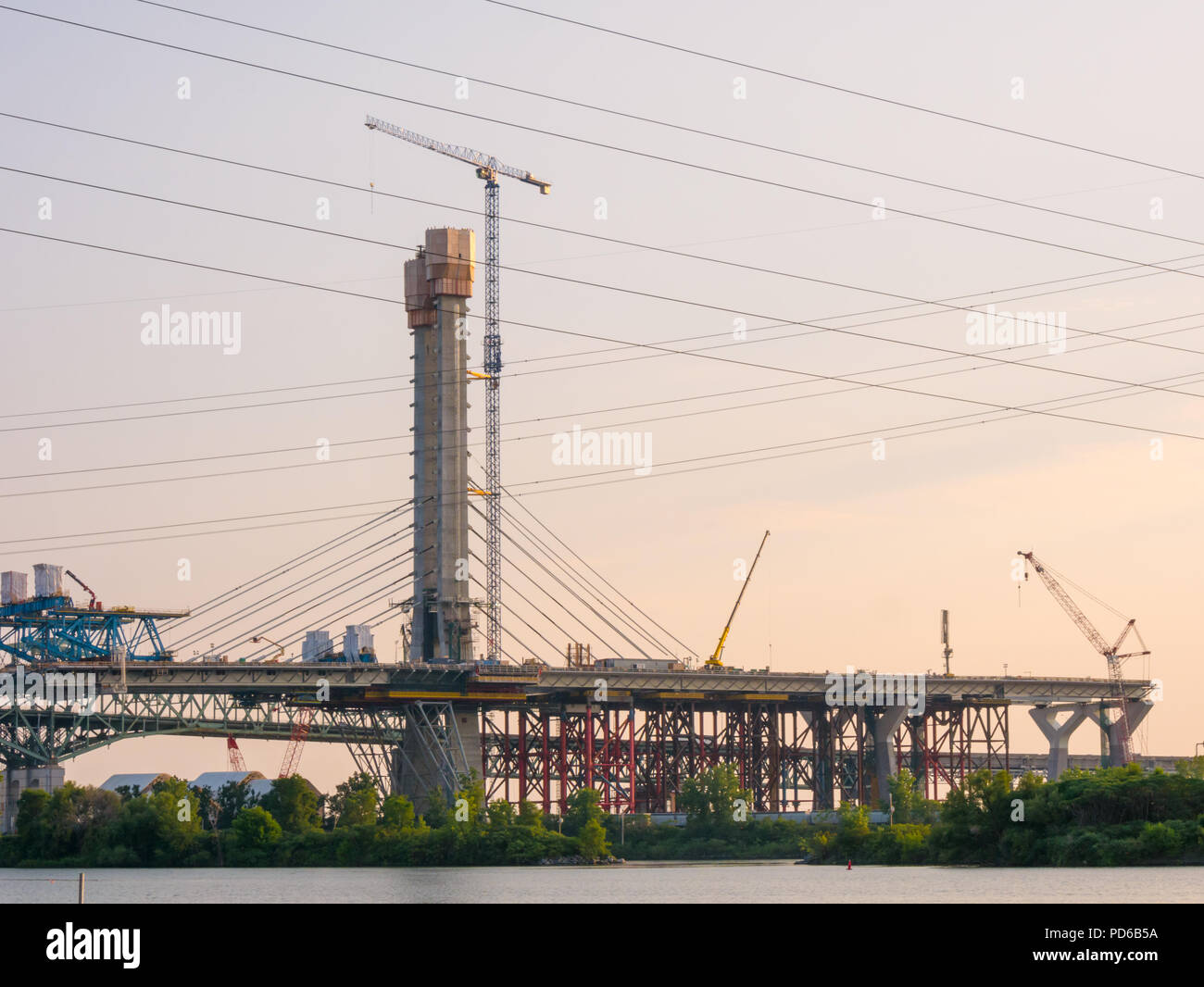 Major bridge construction site at the golden hour, Montreal, quebec, Canada. Stock Photo