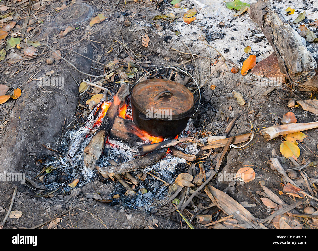 Cooking using a camp over over a campfire, Australia Stock Photo