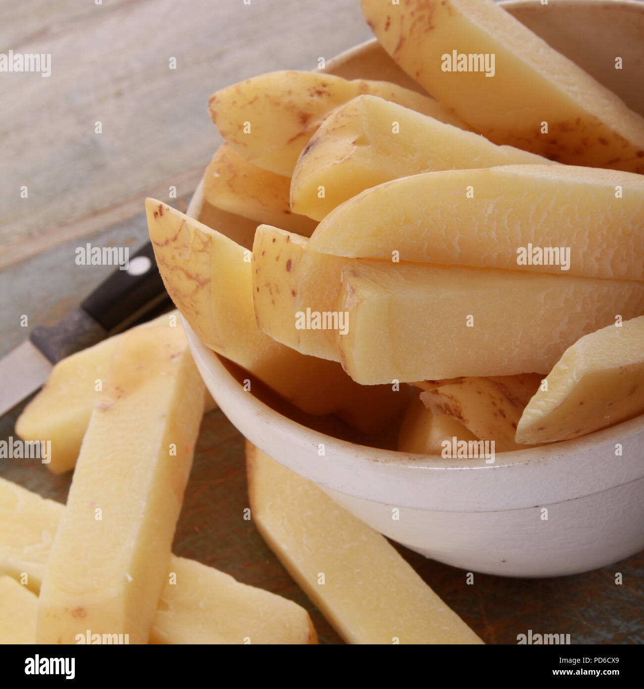 uncooked chipped potatoes Stock Photo Alamy