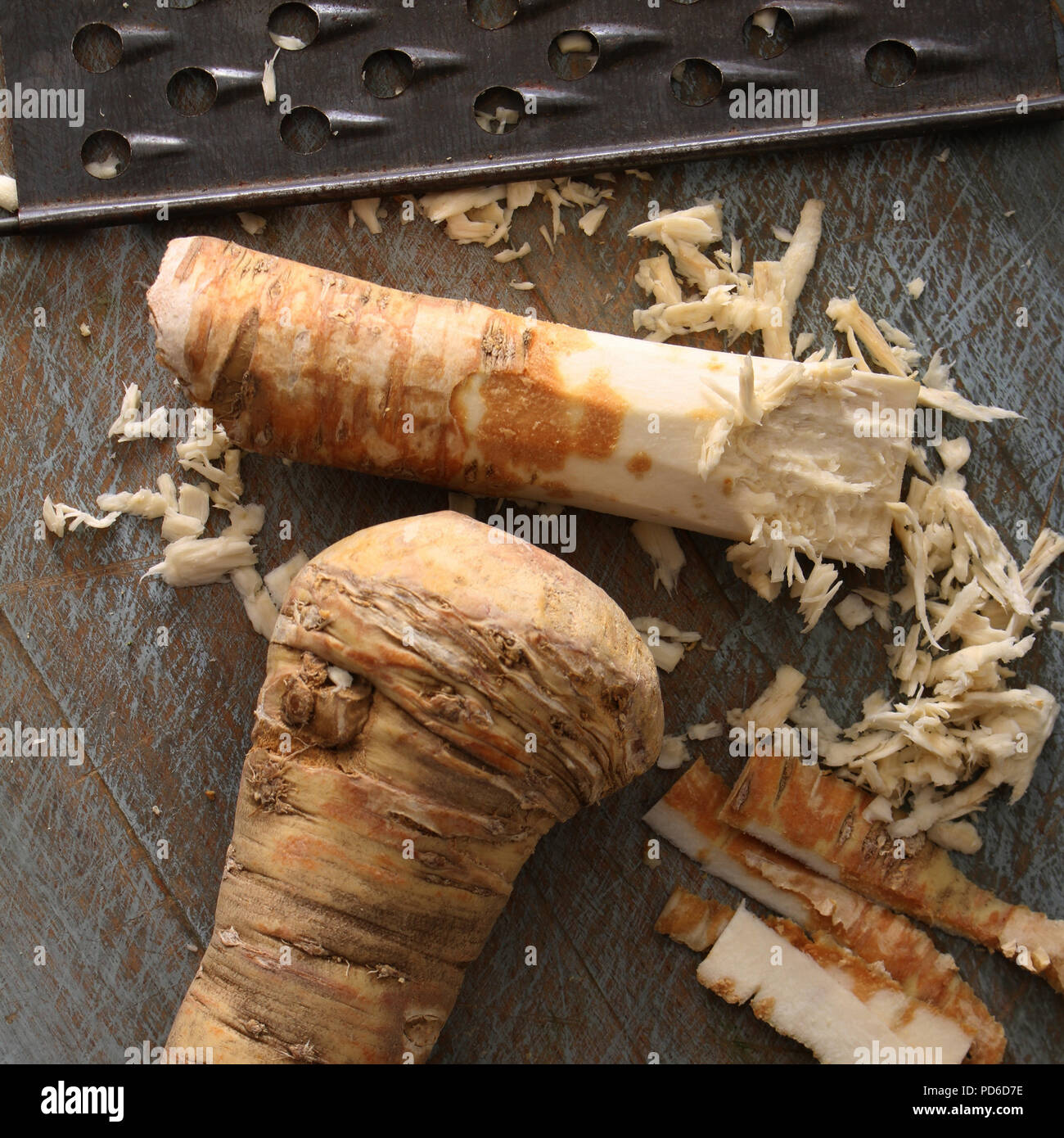 grating fresh horseradish root Stock Photo Alamy