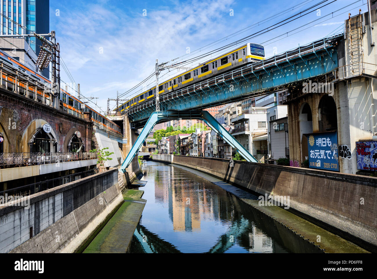 Japan, Honshu island, Kanto, Tokyo, railway lines crossing upon a river. Stock Photo