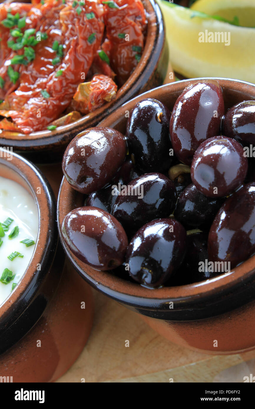 fresh olives in dish Stock Photo Alamy