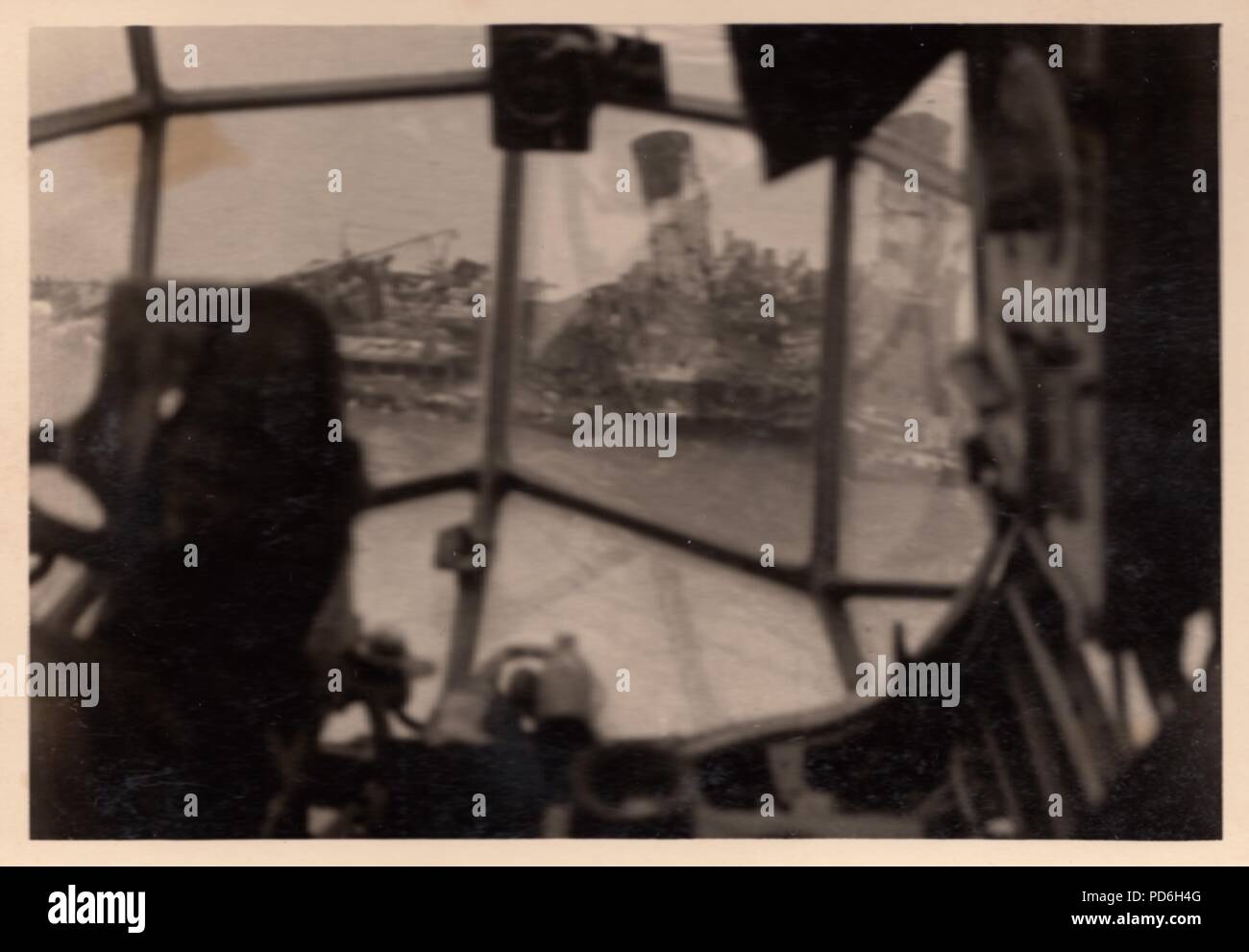 Image from the photo album of Oberleutnant Oscar Müller of  Kampfgeschwader 1: Taken through the nose glazing of a Junkers Ju 88 of 5./KG 1 in 1941, this image is captioned, 'attack on the French cargo ship Flandre 4870 tonnes'. SS Flandre was seized by the Germans when France fell but she activated a German magnetic mine on 13th September 1940 when leaving Bordeaux and grounded in the mouth of the Gironde river. She broke in two the following day and was abandoned, without casualties. It is thought she may have been used for target practice by the Luftwaffe thereafter. Stock Photo