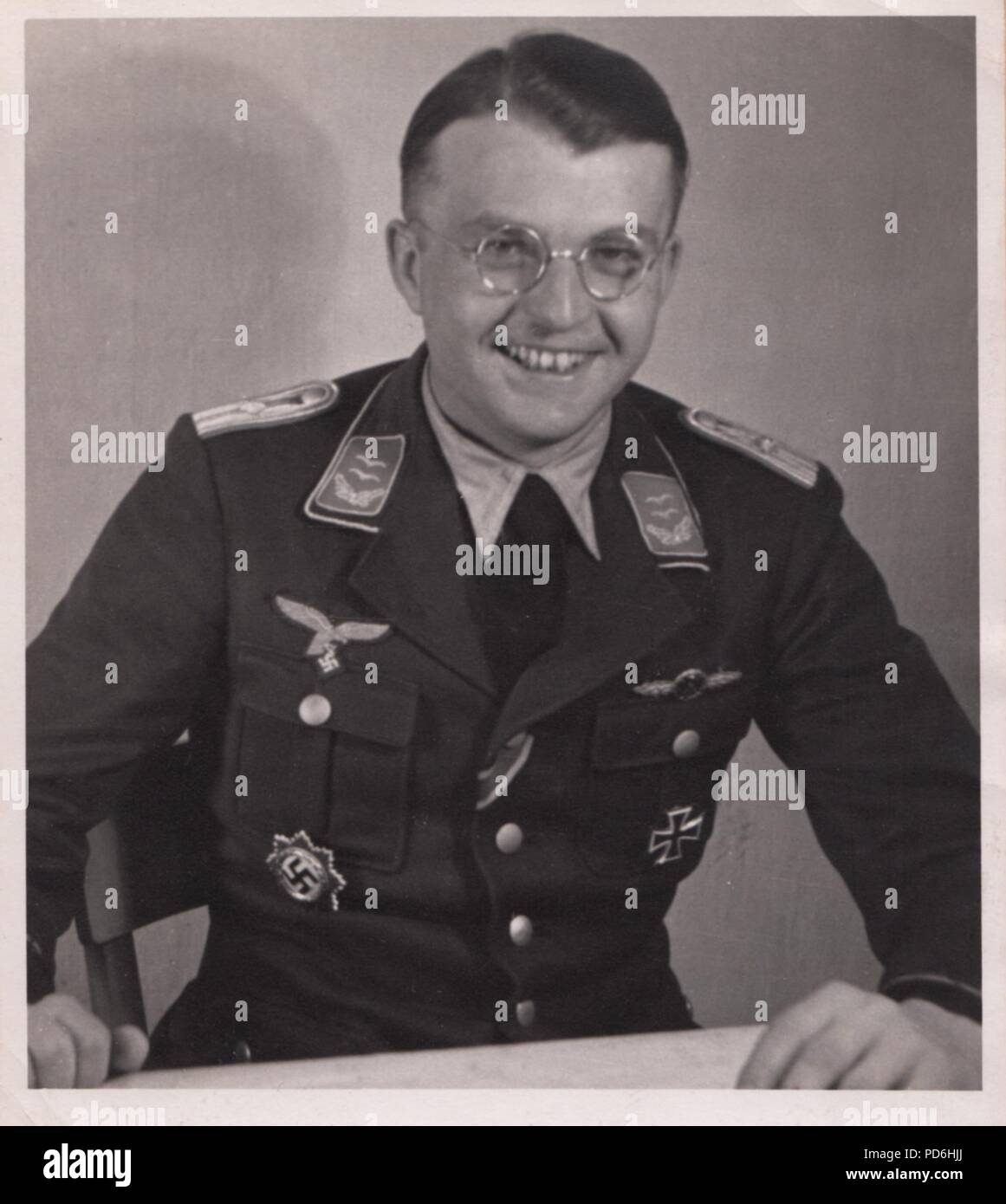 Image from the photo album of Oberleutnant Oscar Müller of  Kampfgeschwader 1: Oberleutnant Hans Sumpf in his office at Dno Airfield in Russia in 1942. Sumpf was Staffelkapitän of 5./KG1 from 7th October 1941 until his death on 26th March 1942. He was posthumously awarded the Ritterkreuz (Knight's Cross of the Iron Cross) on 20th August 1942. Stock Photo