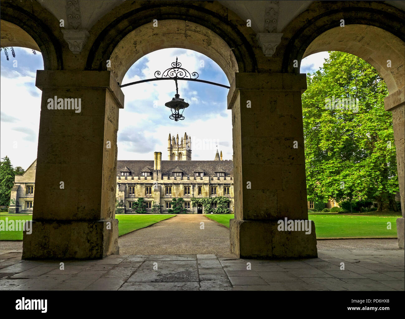 Wide summer view of Magdalen College quad & Great Tower thru arches of New Building Stock Photo