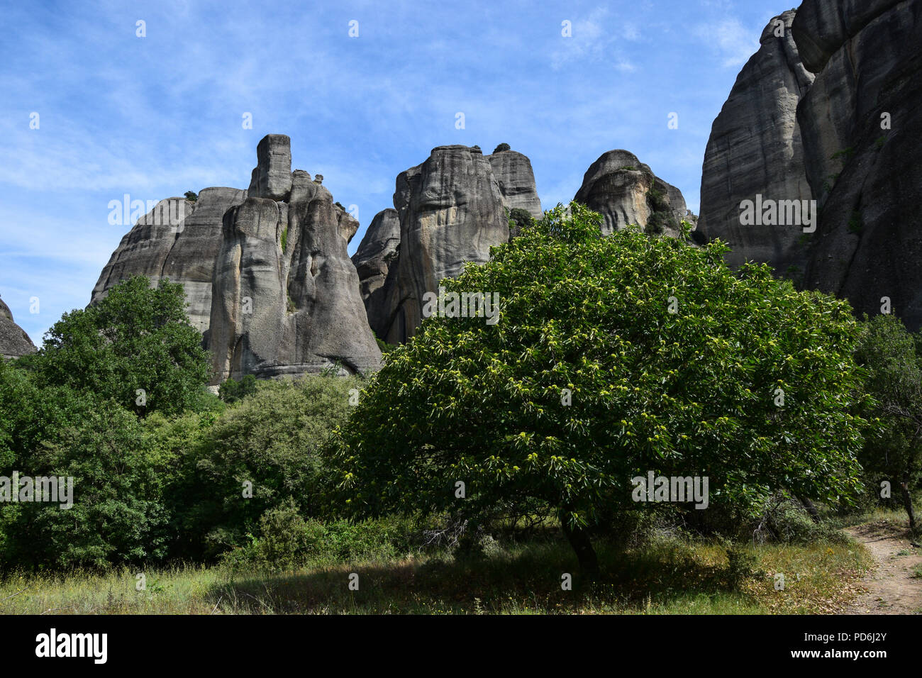 The Meteora is a rock formation in central Greece hosting one of the largest and most precipitously built complexes of Eastern Orthodox monasteries. Stock Photo