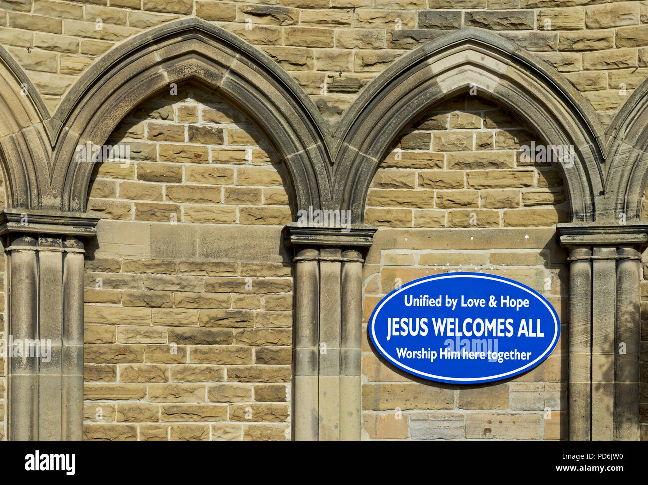 Sign - Jesus Welcomes All - on Methodist Church, Stokesley, Hambleton, North Yorkshire, England UK Stock Photo