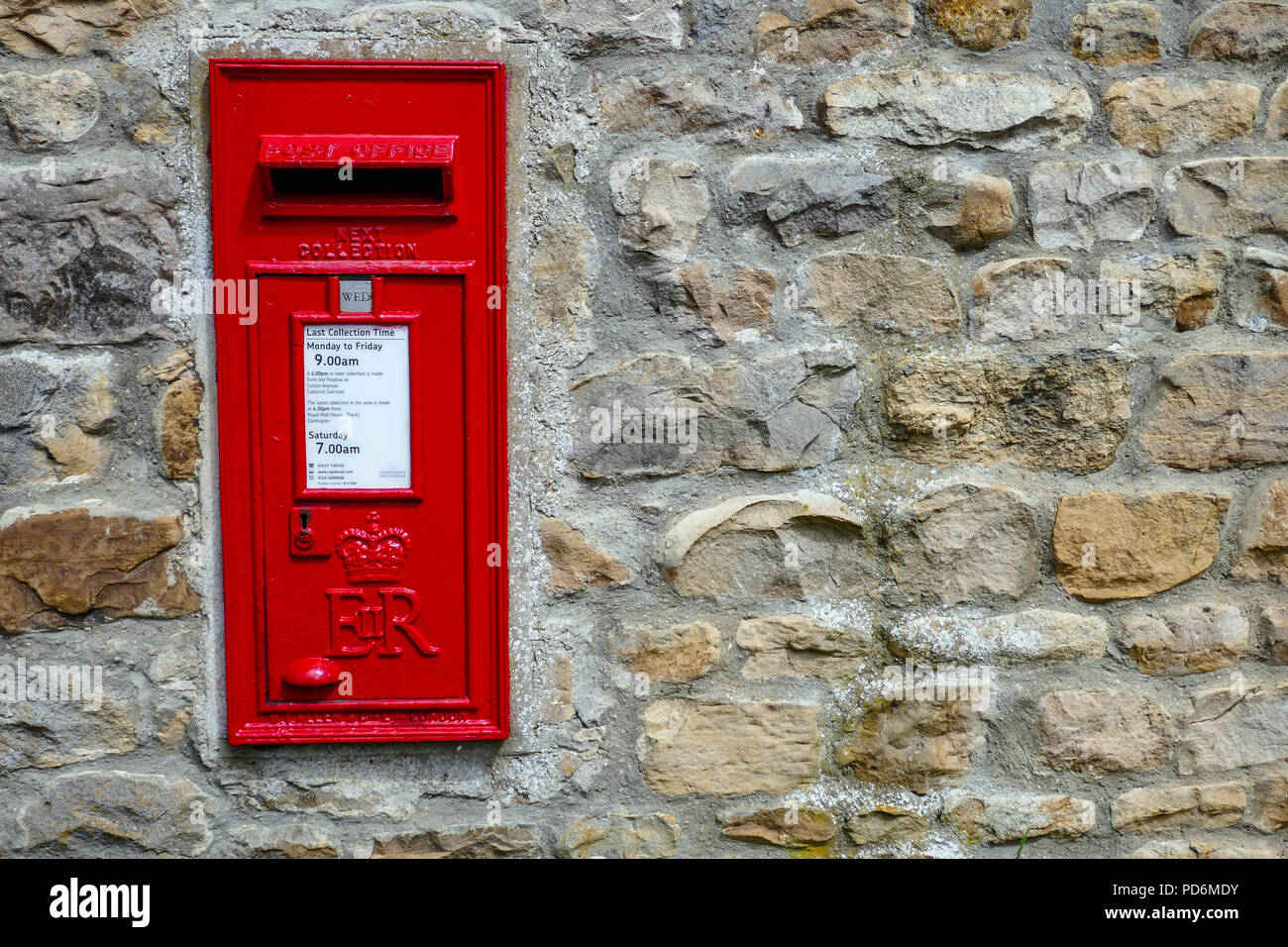 Post Box Red Colour Code Red wall north england hi-res stock photography and images - Alamy