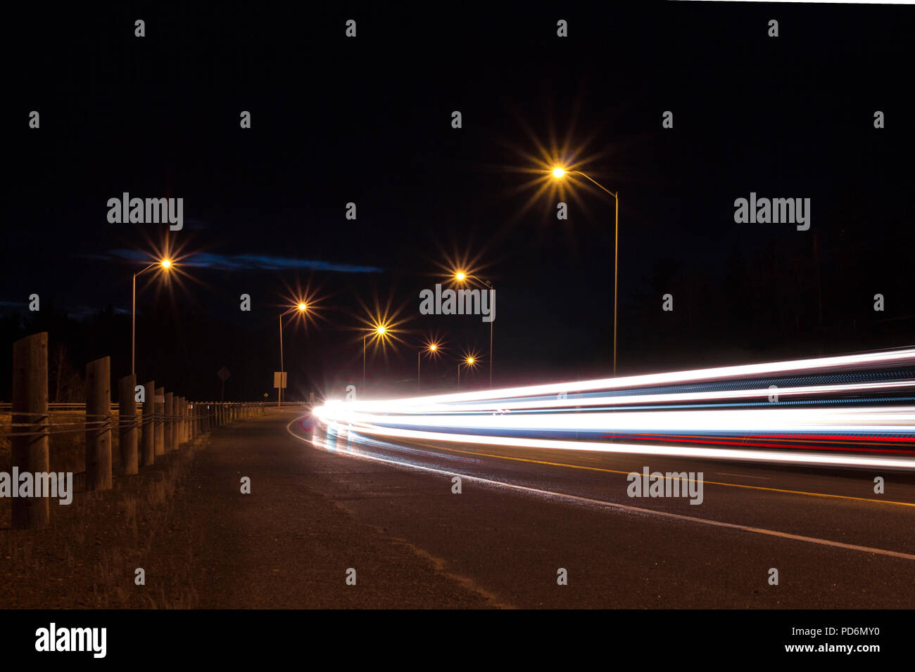 Abstract light trails road yellow hi-res stock photography and images ...