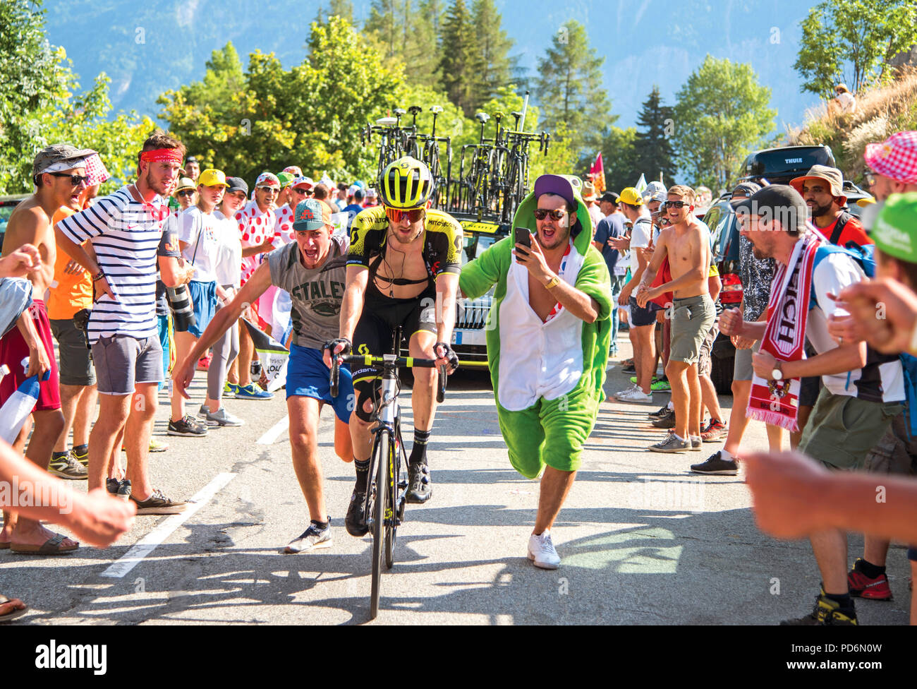 fan pushes cyclist, Dutch Corner, Alpe d'Huez Tour De France 2018 Stock Photo