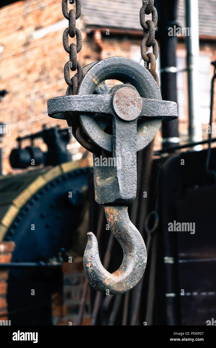 Industrial crane hook suspended inside the ironworks Anchor Forge at Black Country Living Museum, Dudley. Famous usage in TV series Peaky Blinders. Stock Photo