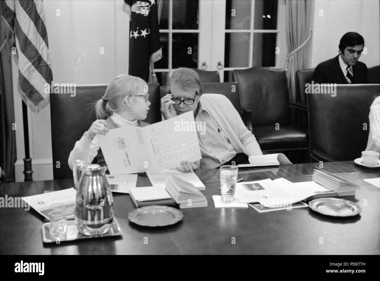 Amy Carter and Jimmy Carter participate in a speed reading course at the White House. - Stock Photo