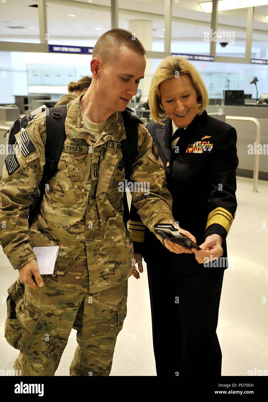 An individual augmentee is welcomed home. (8536337597). Stock Photo