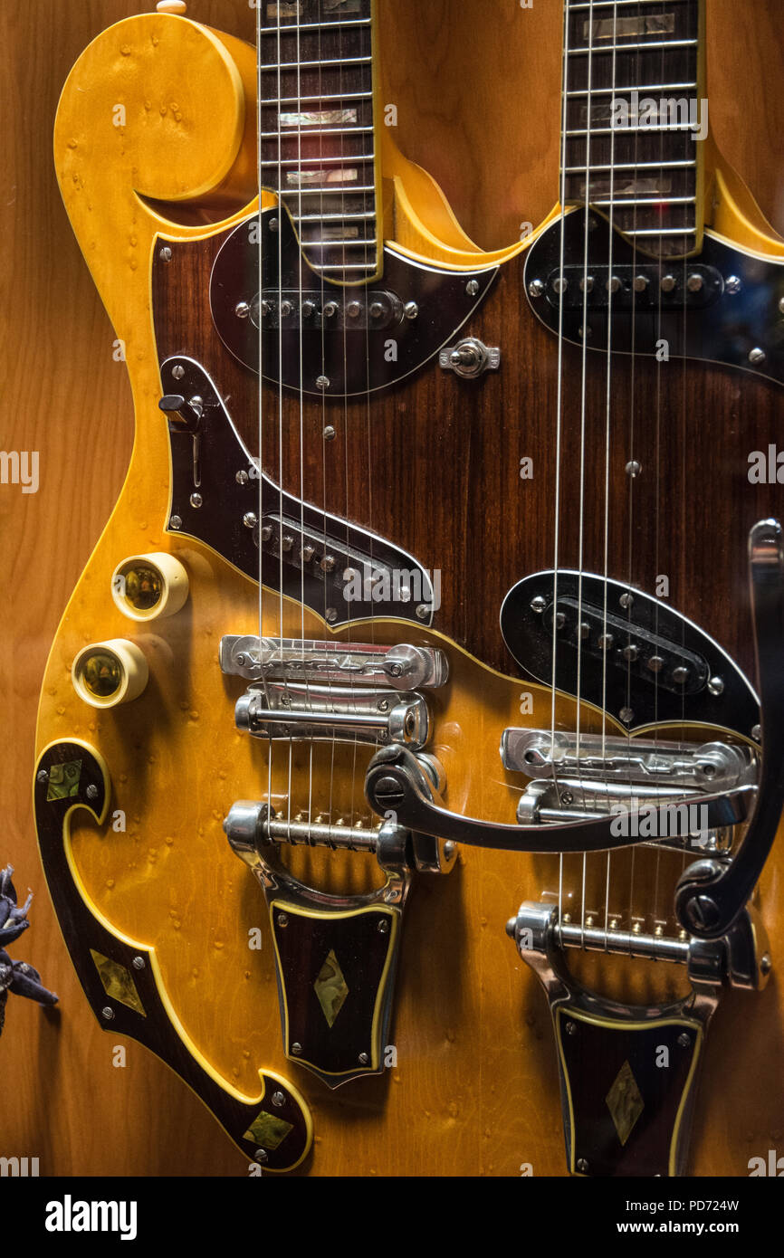 A closeup of a double neck electric guitar on display at the Country Music Hall of Fame in Nashville, Tennessee, USA Stock Photo
