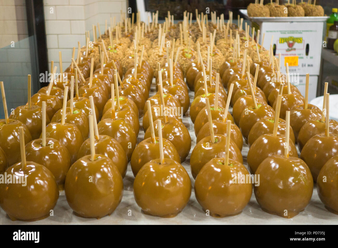 A large tray of candy apples Stock Photo