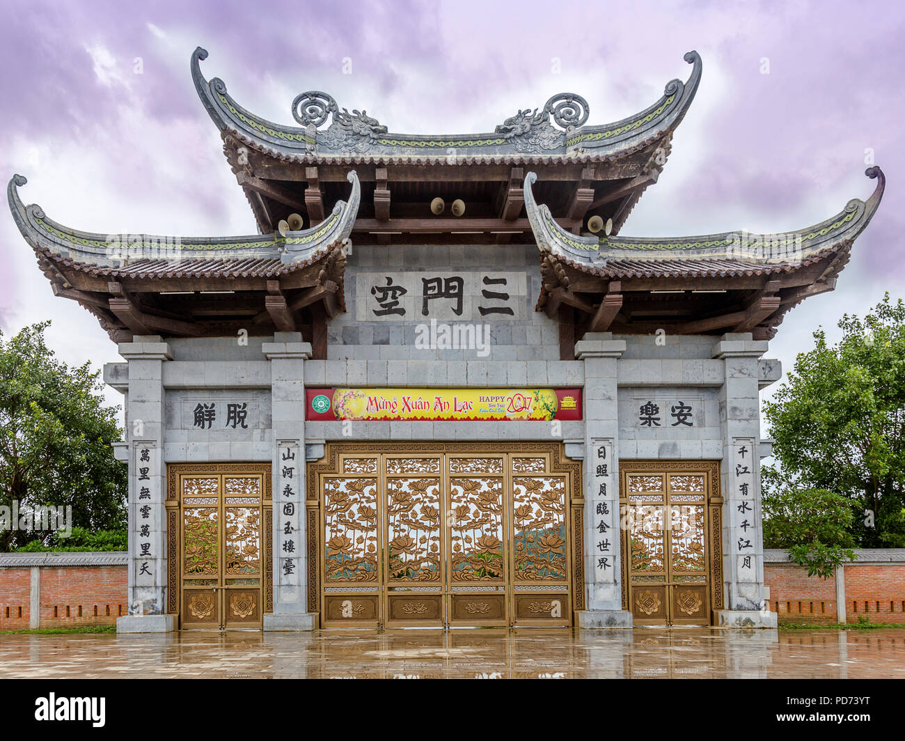 Front entrance gate of buddhist temple, Cổng Tam.  Quan, Gia Sinh, Gia Viễn District, Ninh Bình Province, Vietnam, Stock Photo