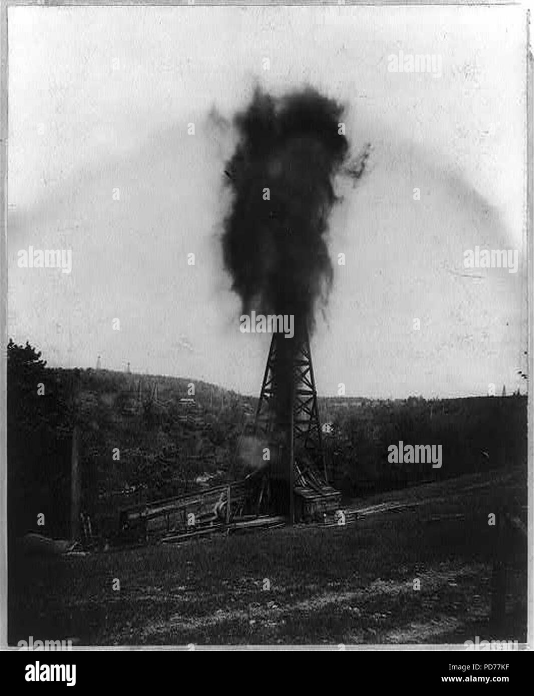 An oil well erupting Stock Photo