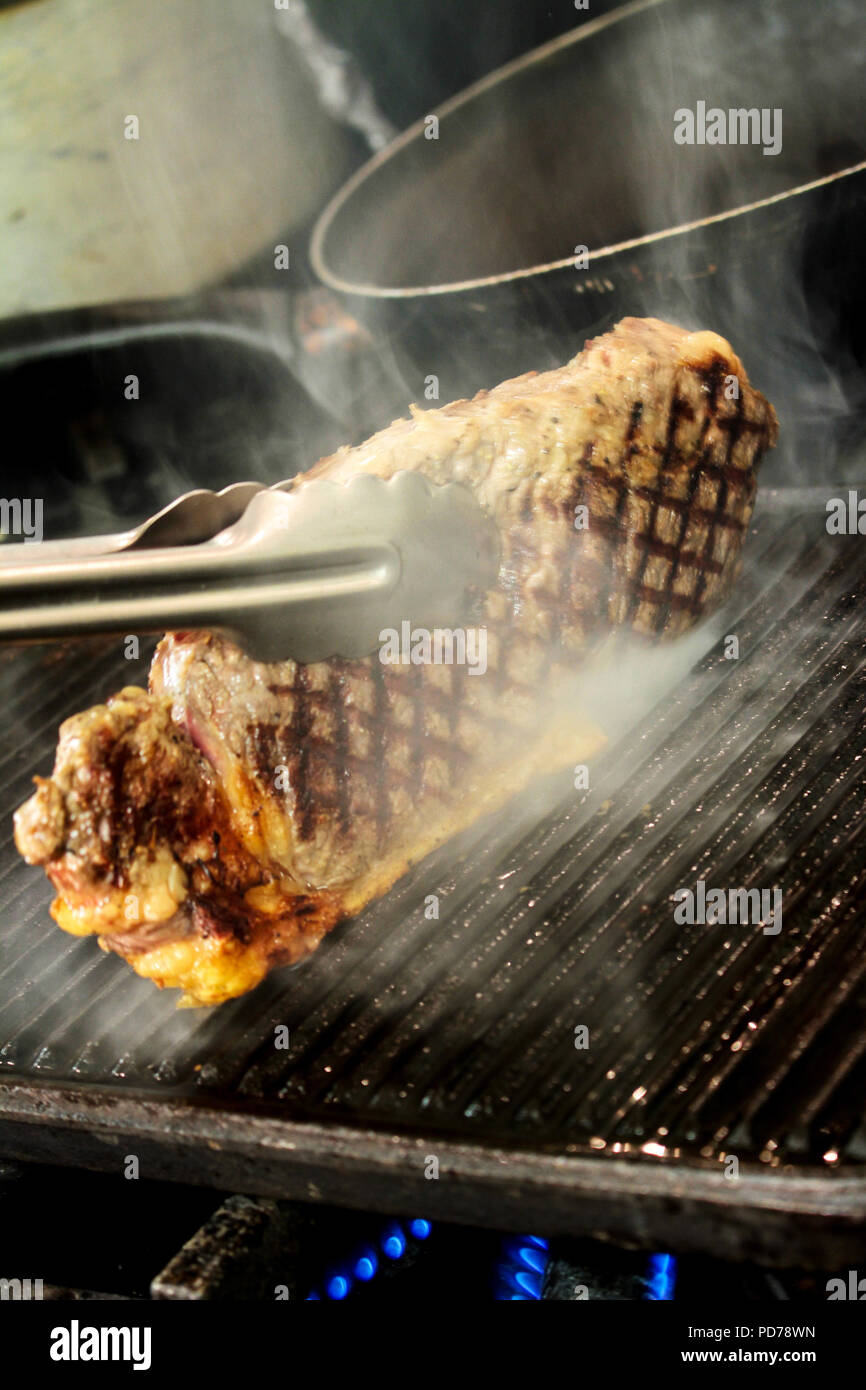 chef cooking sirloin steak Stock Photo Alamy