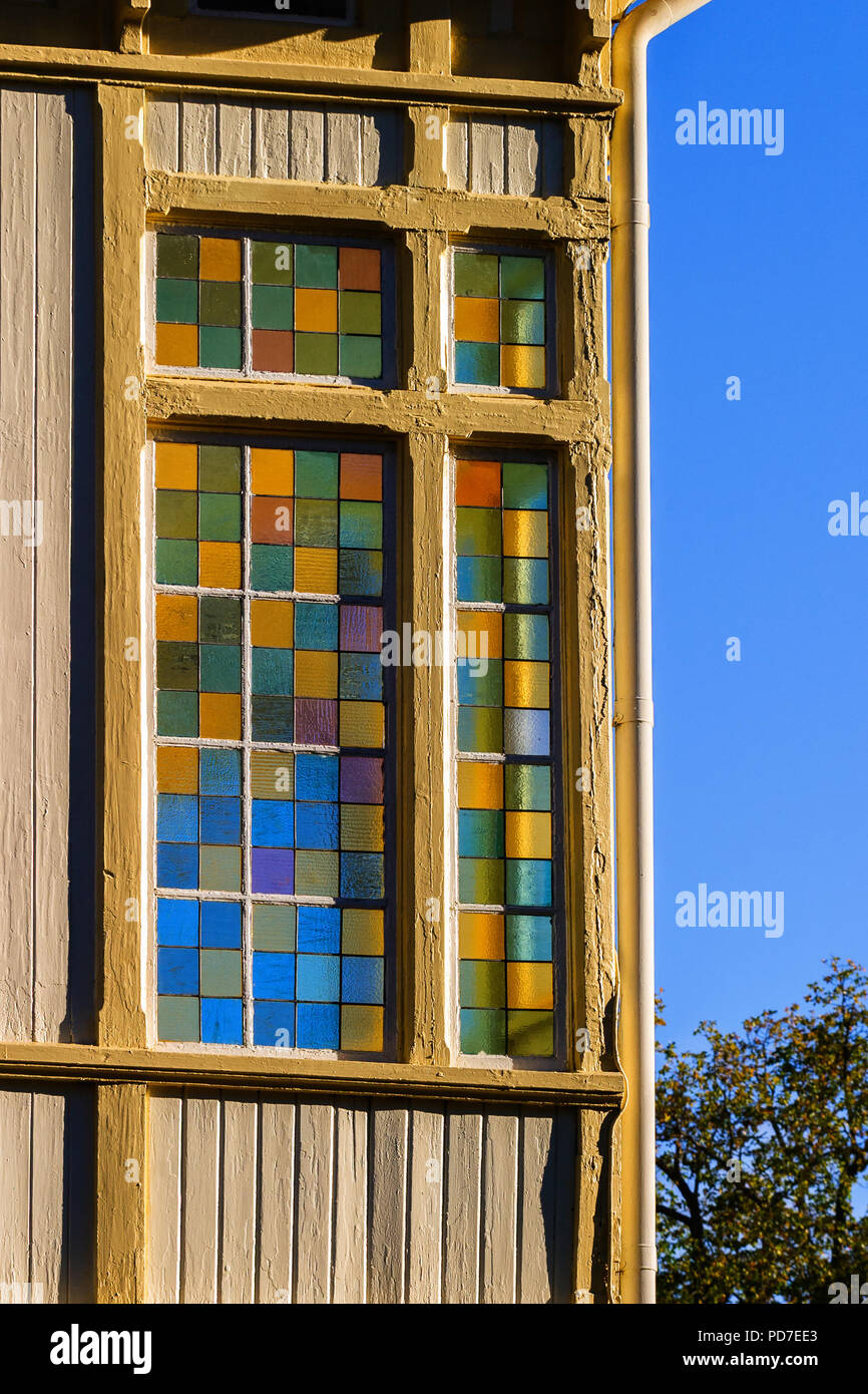 Colorful stained glass window of a house Stock Photo - Alamy