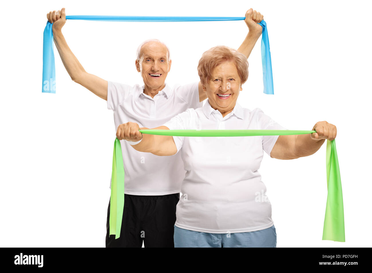 Senior couple exercising with rubber bands isolated on white background