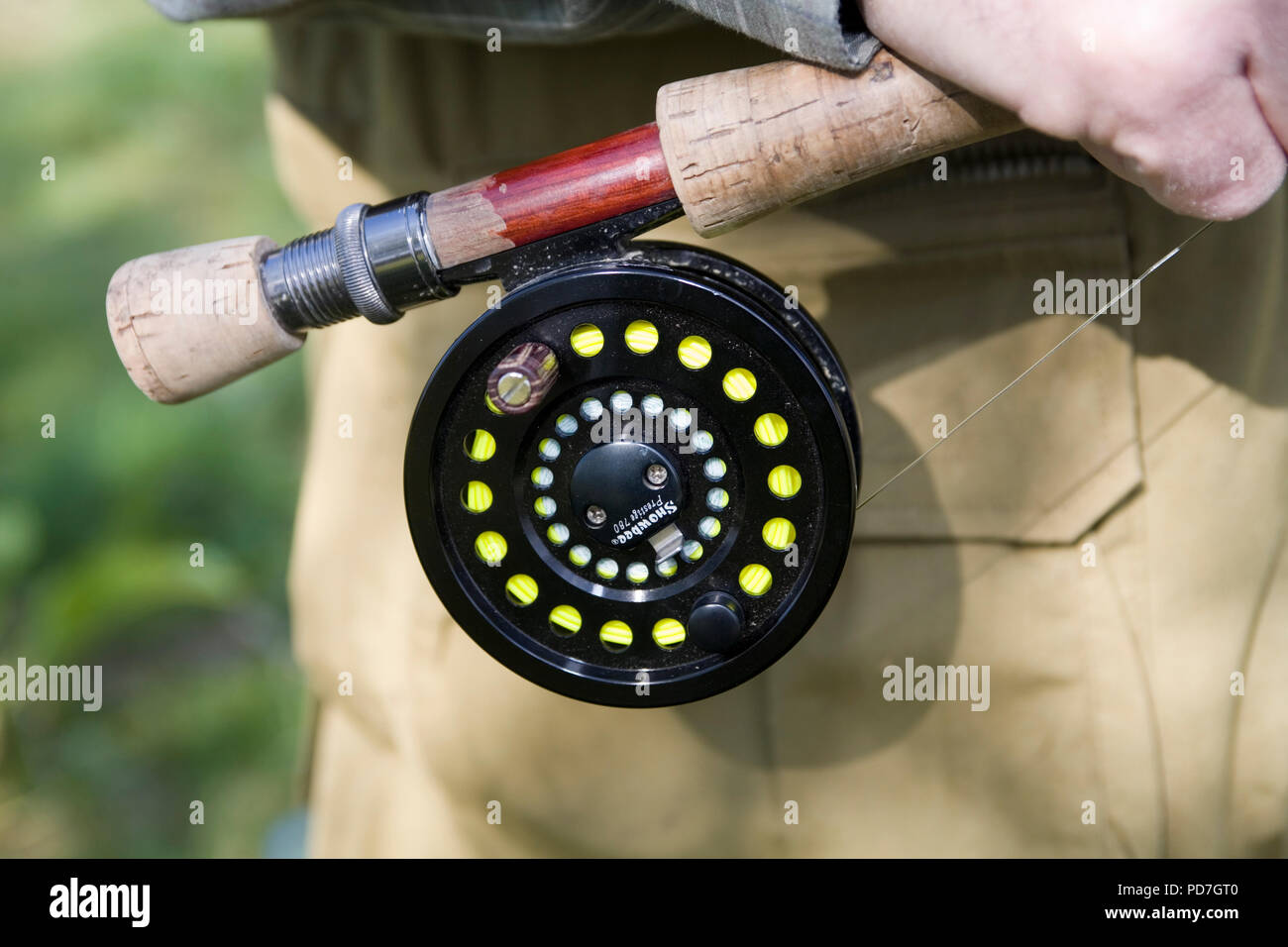 Trout fishing reel Stock Photo Alamy