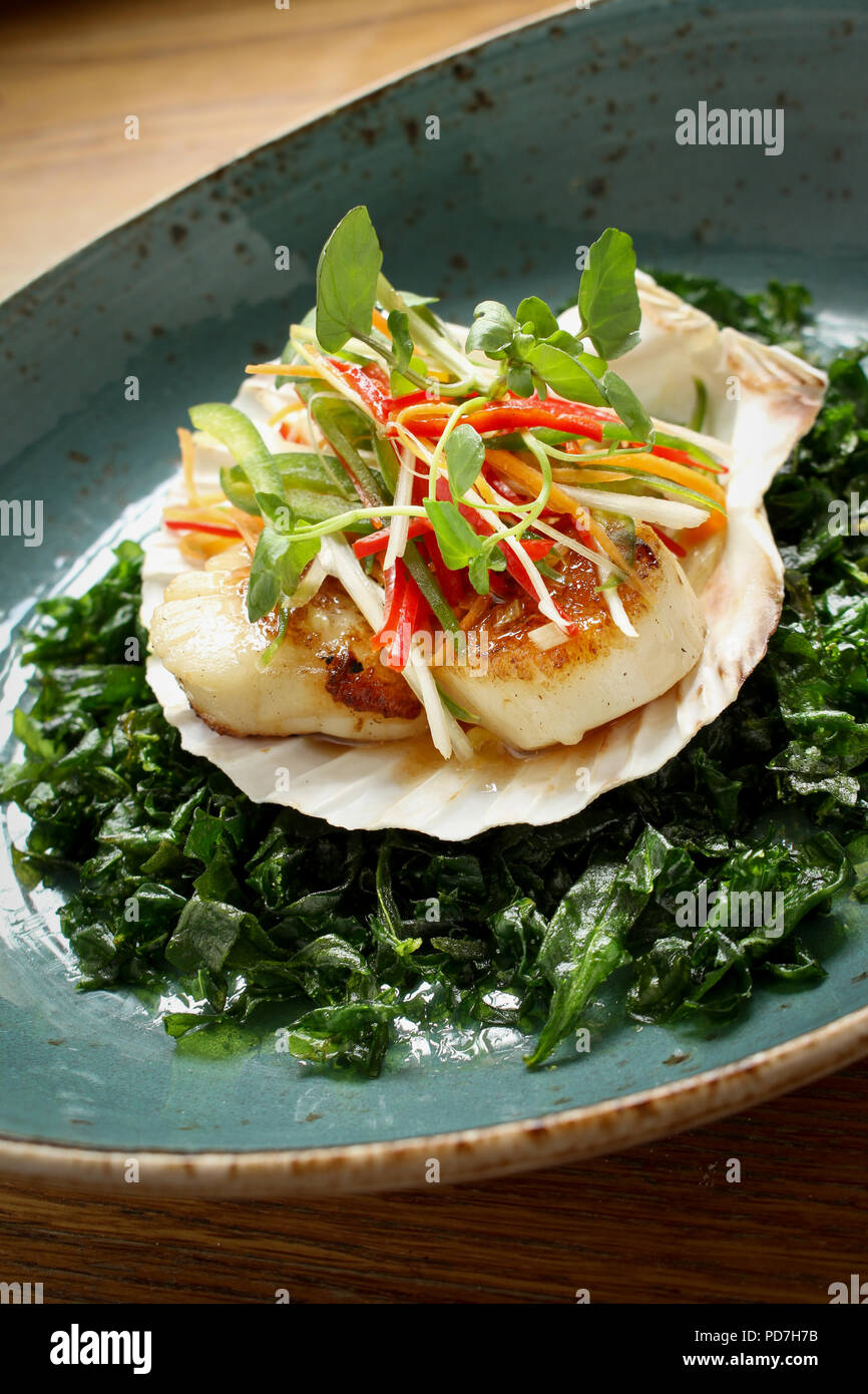 chinese pan fried scallops Stock Photo - Alamy