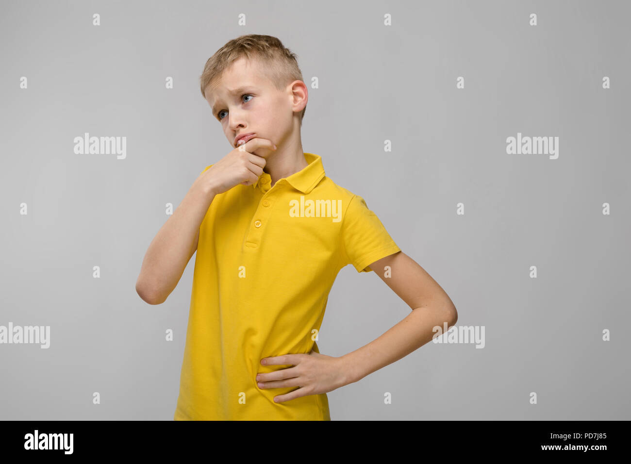 Puzzled Little Boy High Resolution Stock Photography and Images - Alamy
