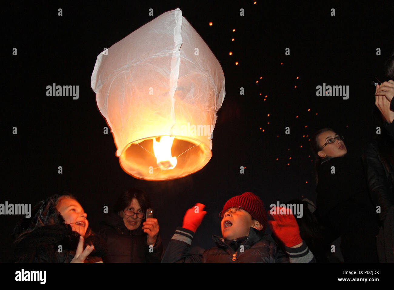 People release many sky lanterns for celebration of the lights, for fun and make wishes in Sofia, Bulgaria – dec 02, 2011. Diwali or Deepavali Hindu Stock Photo